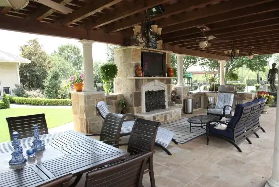 Expanded outdoor living including kitchens, fireplaces, fire pits, arbors, and landscaping
