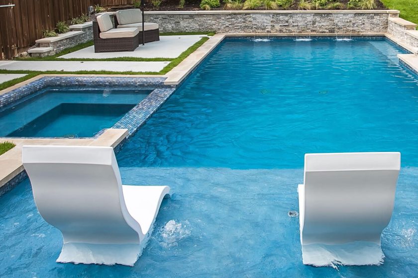 Geometric Pool with Leveled Spa and Tanning Ledge
